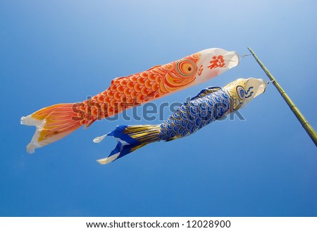 Blue and Red Carp Kites in blue sky, decoration on the Children\'s Day, Japan