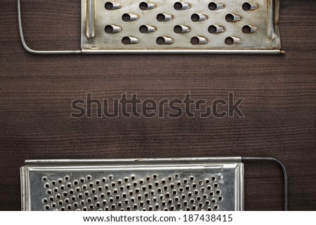 natural aged old rusted grater on the wooden table