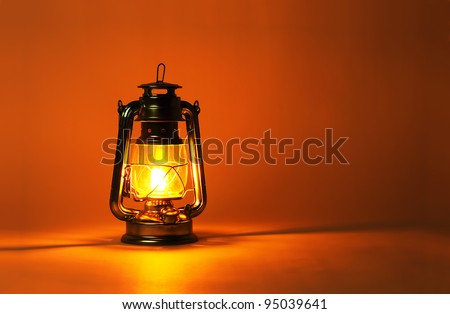 Background burning kerosene lamp, concept lighting