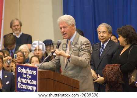 Horizontal view of former president Bill Clinton speaking at a rally for Hillary Clinton\'s campaign at the University of New Mexico.