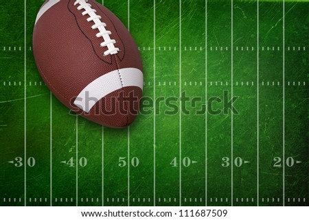 College football against textured field background
