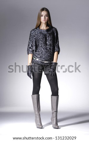young casual man full body fashion woman with gloves posing