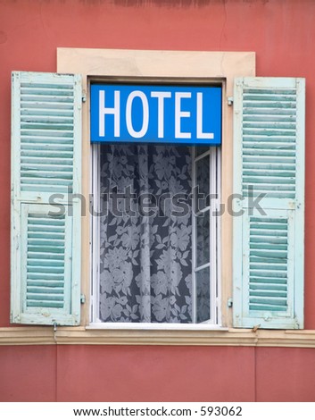 Hotel sign in a window in Nice, France