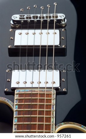 Electric Guitar curves.  fairly shallow dof, with focal point on front pickup.