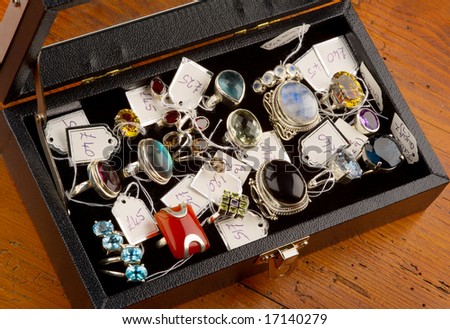 Jewellery in a display box, with price labels