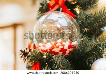 Similar – Image, Stock Photo New reality, xmas tree decorated with face masks