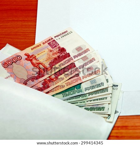 Envelope With Russian currency on the table closeup