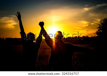 Vignetting Photo of Silhouette of a Two Friends on Sunset