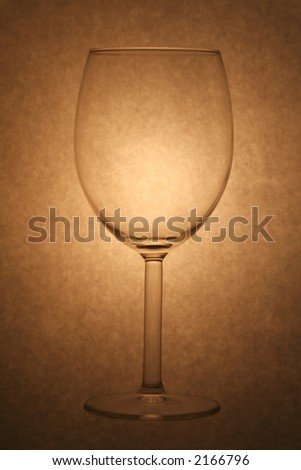 a wine glass in yellow tone