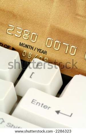credit card and keyboard, concept online shopping or banking