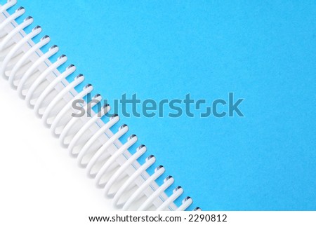 A blue spiral notebook.