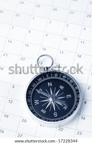 Calendar and compass, concept of time planning