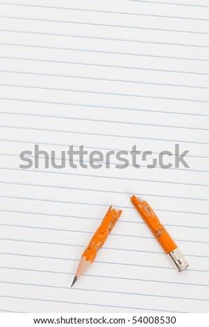Broken Pencil and notepad, concept of frustration