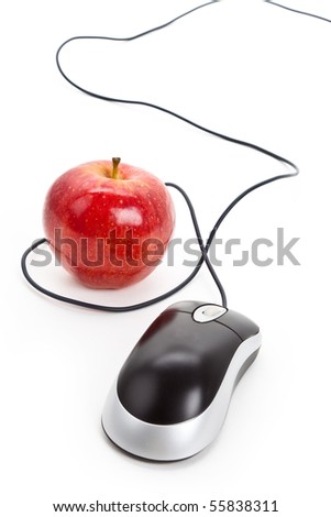 Computer Mouse and red apple close up