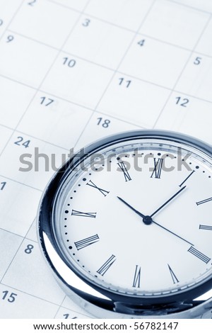 calendar and clock close up shot
