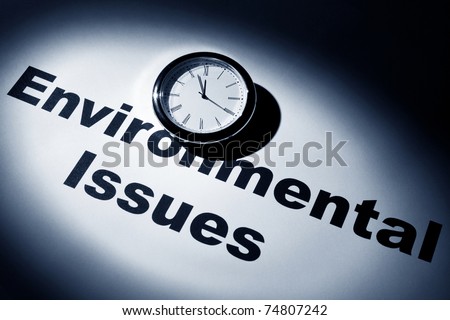 Clock and word of Environmental Issues for background