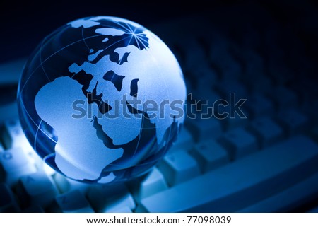 Blue Globe and Computer Keyboard for background