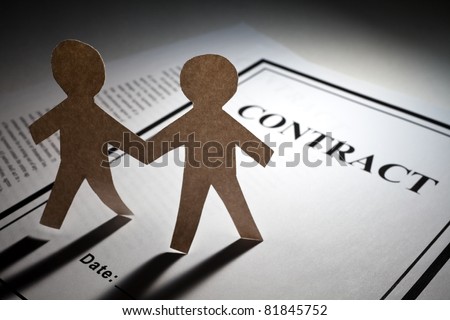 Contract and Paper Chain Men close up