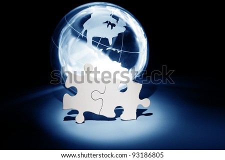 Globe and White Puzzle, business concept