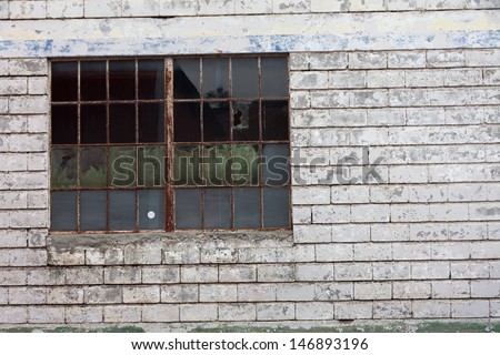 Rusty Metal Window and white birck wall