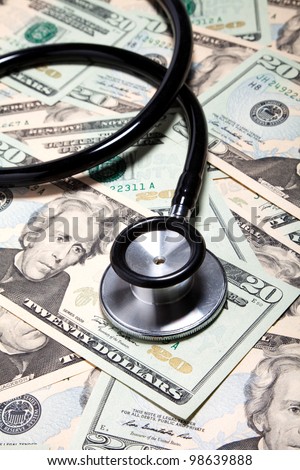 Stethoscope and dollar, concept of Financial Health
