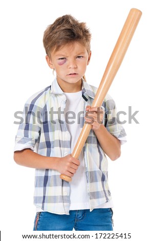 Anger boy with real eye bruise holding wooden baseball bat, isolated on white background