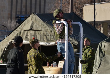 TORONTO - NOVEMBER 24: Department of National Defense and the Canadian Forces set up an obstacle course for visitors on November 24, 2012 at Toronto Nathan Philips Square.