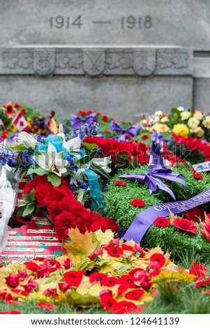 TORONTO - NOVEMBER 11: Wreaths are laid at Old City Hall Cenotaph after Remembrance Day Services in Toronto, Canada on November 11, 2012.