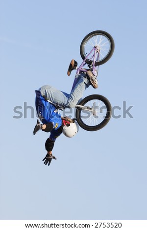 BMX bike rider performing in the Giant Bicycle Stunt Team Show