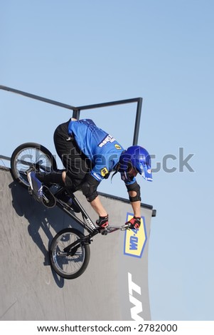 Bmx biker performing in the Giant Bicycle Stunt Team show