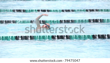 Boy swimming freestyle