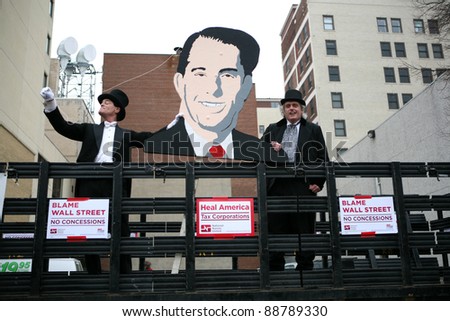 MADISON,WI - FEB 19: Opponents hold a image of Gov Scott Walker, at a march protesting his attack on public workers on Feb 19, 2011 in Madison, WI.  The Wisconsin drive to recall Walker starts Nov 15.
