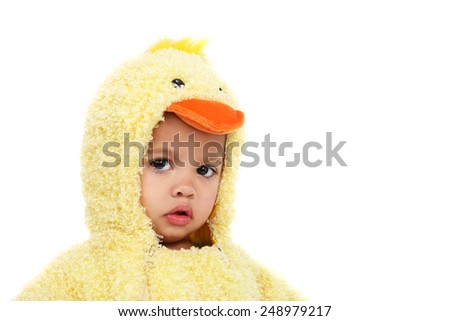 Young girl in a chicken costume looking sad
