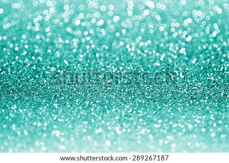 Abstract teal or turquoise green glitter sparkle background
