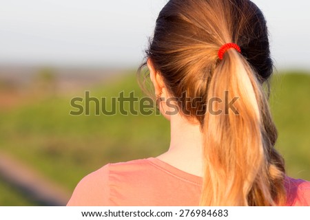 girl with a ponytail hairstyle for sports
