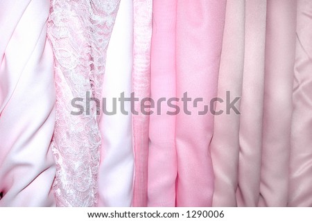Bolts of pink fabric.