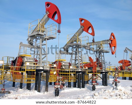 Oil and gas industry. Work of oil pump jack on a oil field.