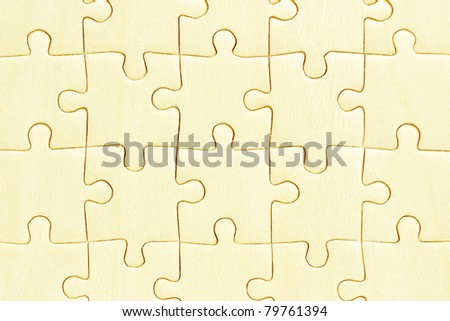 Close up of wooden jigsaw puzzles background