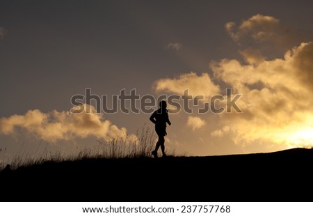 Men on a Scotish hill- Arthur Seat. Landscape view. Scottisch landscape. sunset, view, tourism, traveling, walking.