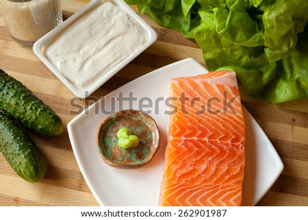 Sushi prepared with rice, raw tune, raw salmon, wasabi sauce, majo, soya sauce, prawn and avocado, lettuce rice . You can find it at japanese restaurant. Japan, japanese food, Asia