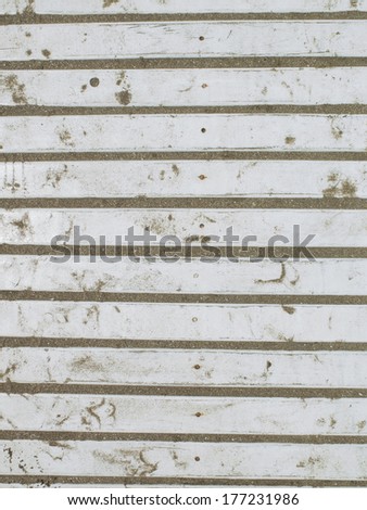 Texture of wooden floor for protection for the feet of the warm sand on beaches.