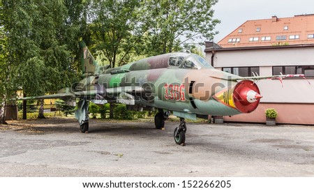 SOSNOWIEC, POLAND - AUGUST 31: Withdrawn from service fighter-bomber SU22 used for educational purposes in technical school, on August 31, 2013. Produced in USSR  aircraft is still used in Polish Army