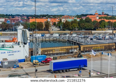 YSTAD, SWEDEN - AUGUST 15, 2014: Ferry embarkation in the Port of Ystad. The ferry port provides services to Swinoujscie in Poland and forms a part of the E65 trans-European route Sweden - Greece.