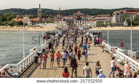 SOPOT, POLAND - AUGUST 06, 2014:  Skyline of Sopot taken out of the wooden pier. The pier built in 1827 at 511 m remains the longest wooden pier in Europe and is the main attraction of the resort.
