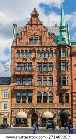 MALMO, SWEDEN - AUGUST 11, 2014: The city\'s oldest pharmacy Apoteket Lejonet on City Hall Square, well-known for its vintage Art Noveau interior with carved wooden shelves and glass-plated ceiling