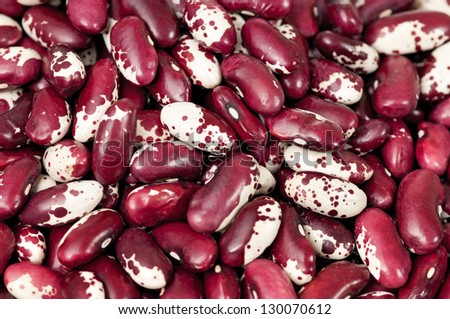 Raw haricot beans two-color close up background