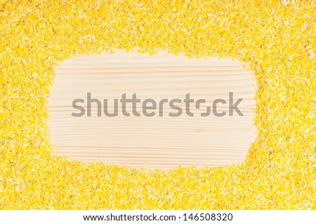 Corn flakes  on a wooden surface with area for your text