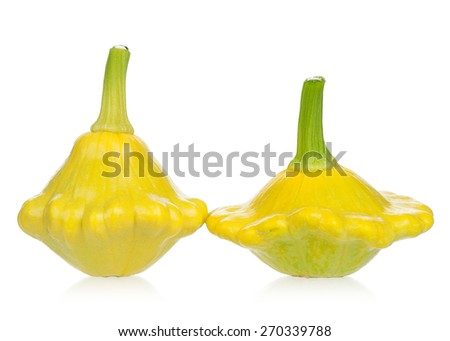 Two bright patty pan squash isolated on white background