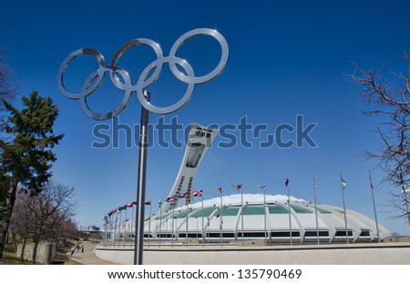 MONTREAL,CANADA - CIRCA APRIL 2013. The Montreal Olympic Stadium with olympic rings. The tower is the tallest inclined tower in the world at 175 metres (574 ft). Circa April 2013, in Montreal.