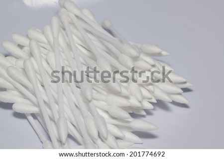 cotton buds on paper background